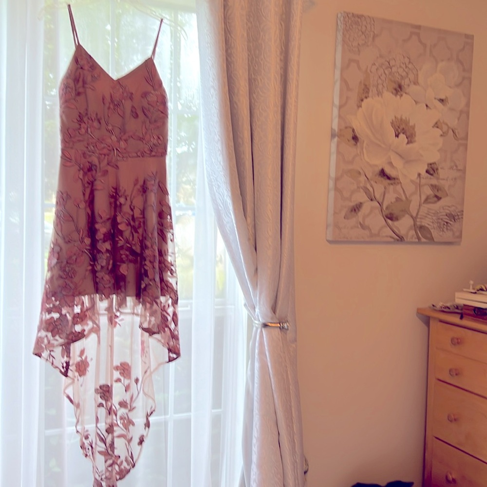 Brand is two sisters, size 2, color is pink mauve.